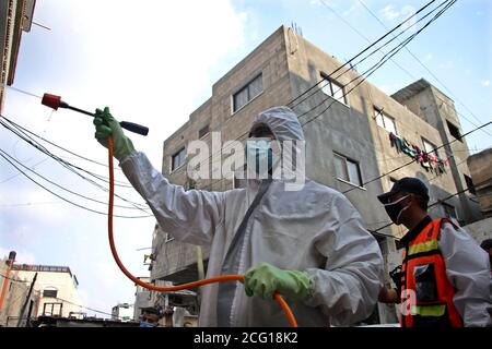 Gaza. 8th Sep, 2020. A Palestinian worker disinfects a street in Gaza City, on Sept. 8, 2020. Palestine on Tuesday recorded 717 new cases infected with the novel coronavirus, raising the total number of infections to 35,518. The Hamas-ruled Gaza Strip has been under a full lockdown since Aug. 24 to contain the outbreak of the virus. Credit: Rizek Abdeljawad/Xinhua/Alamy Live News Stock Photo