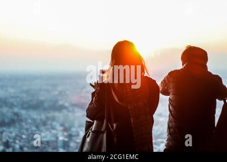 People looking out over the city at an observation deck. Yokohama, Japan Stock Photo