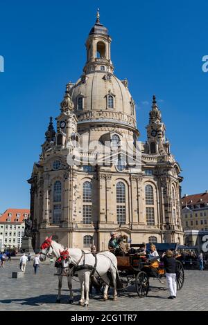 Dresden, Saxony / Germany - 3 September 2020: horse and carriage in front of the Frauenkirche Church in downtown Dresden Stock Photo