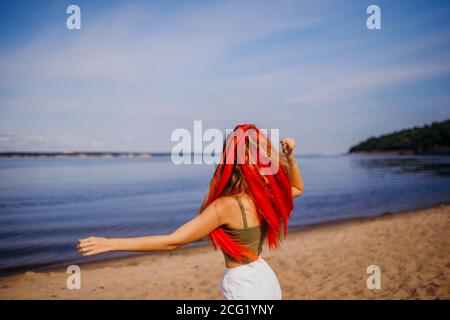 Kanekalon hair red and blue isolated on white background. Summer. Stock Photo