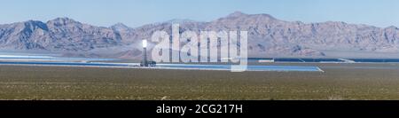 The Ivanpah Solar Power Facility, a concentrated solar thermal plant  in the Mojave Desert near Ivanpah, California and Primm, Nevada, is one of the l Stock Photo