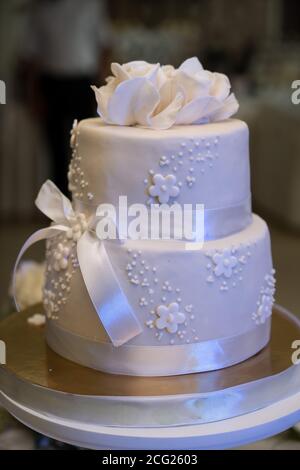 Wedding cake, hands and the knife, cutting Stock Photo