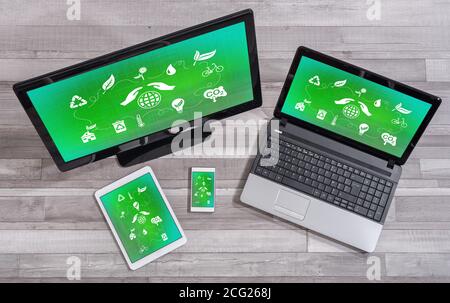 Environment protection concept shown on different information technology devices Stock Photo