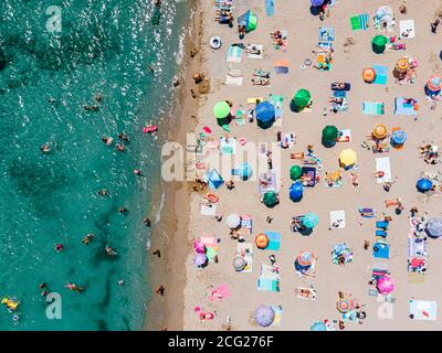 Aerial Ocean Beach Photography, People And Umbrellas On Seaside Beach