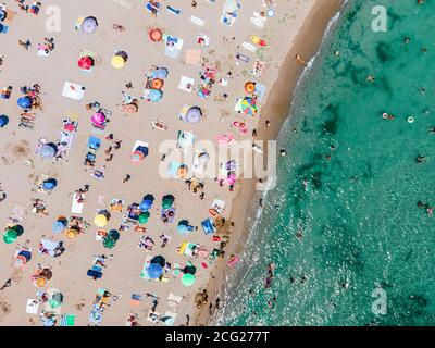 Aerial Beach Photography, People And Colorful Umbrellas On Seaside Beach