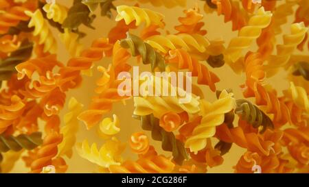 Freeze motion of flying uncooked pasta, food preparation concept Stock Photo