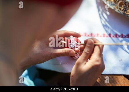 Workshop of decorating easter eggs  in beautiful hungarian village Holloko, Hungary Stock Photo