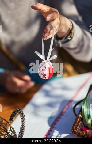 Workshop of decorating easter eggs  in beautiful hungarian village Holloko, Hungary Stock Photo