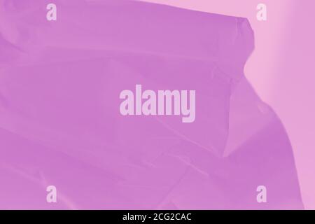 Light fuchsia color flowing fabric, abstract background Stock Photo
