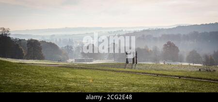 Panorama featuring Henry Moore's Upright Motives No. 1 (Glenkiln Cross) at Yorkshire Sculpture Park near Wakefield, Yorkshire, UK Stock Photo