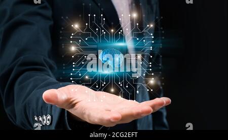 AI For Business. Unrecognizable Businessman Holding Microchip Holgram With Digital 3D Brain Stock Photo