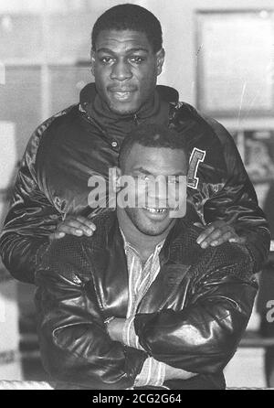 Library file 222438-5, dated 20.3.87. Mike Tyson (front) with British Heavyweight boxer Frank Bruno  during a break in training for Bruno's fight against James 'Quick' Tillis. PA Photo. Stock Photo