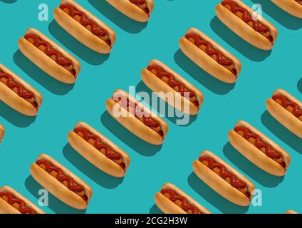 Set Of Tasty Hot Dogs With Sausage And Ketchup On Turquoise Background Stock Photo