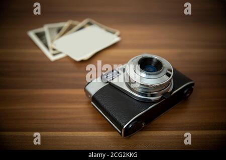 Vintage film camera on wood background Stock Photo