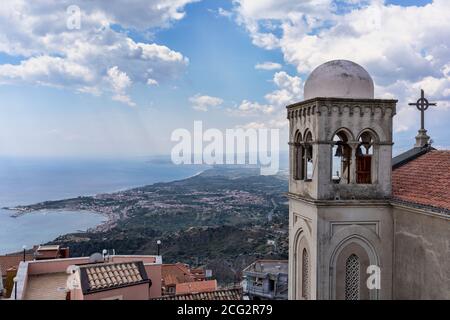 Top of San Niccolo di bari duomo and view of Taormina from Castelmola Stock Photo