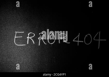 Error 404 written on green board with chalk, Page Not Found Error 404 written on a blackboard with chalk. Stock Photo