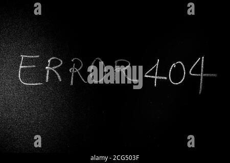 Error 404 written on green board with chalk, Page Not Found Error 404 written on a blackboard with chalk. Stock Photo