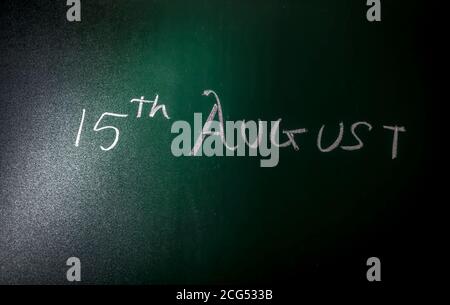 Happy Independence Day 15 August written on a blackboard with chalk for independence day celebration. Stock Photo