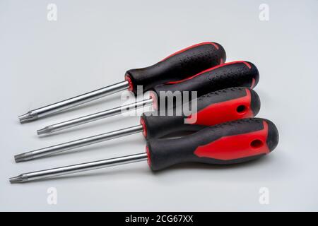 Torx Screwdrivers set with distinct 6 -point star shaped heads on white background known as star screwdrivers or star bits Stock Photo