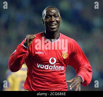 Manchester United's Andy Cole celebrates scoring the English team opening goal against the Belgium side Anderlecht, during their Champions' League Group G match at Man Utd's Old Trafford ground in Manchester. Stock Photo