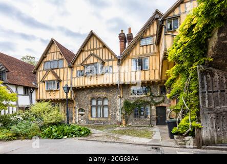 Cheyney Court on the east side of Prior's Gate: historic timbered houses at the entrance to Cathedral Close in Winchester, Hampshire, south England Stock Photo