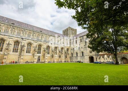 Flying buttresses and stonework on the south side of the exterior of Winchester Cathedral in Winchester, Hampshire, south England Stock Photo