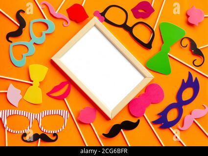 Paper accessories on a stick for a photo shoot Stock Photo
