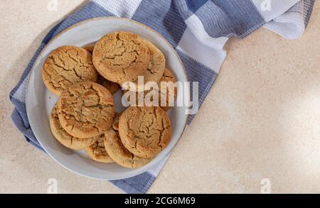Overhead of peanut butter cookies on a plate with copy space Stock Photo