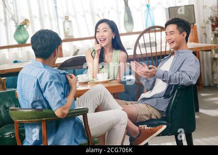 Young friends in a cafe Stock Photo