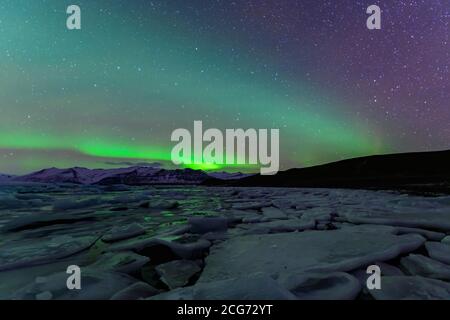 Northern lights over Jokulsarlon lagoon, Vatnajokull Glacier National Park, Iceland Stock Photo