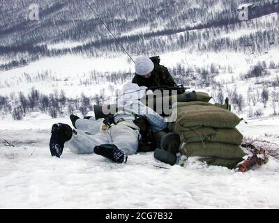 Royal Marines on patrol in Norway.  Members of 3 Commando Brigade's arctic and mountain warfare troops might take part in any follow-up land operation in Afghanistan, once the current phase of air strikes is over.  *... But Defence Secretary Geoff Hoon hinted Friday October 12, 2001 that any deployment of ground troops inside Afghanistan by America and its allies may have to wait until next spring warning of the difficulties of campaigning during the country's harsh winter, now just two or three weeks away. Stock Photo