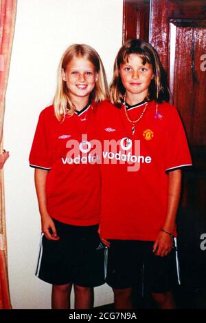 Holly Wells (left) and her best friend, Jessica Chapman, both 10 and who disappeared from Soham, Cambridgeshire late on Sunday, pictured in their Manchester United shirts. PICTURE ADVISORY 03/11/03. Attention Picture Editors and Chief Sub-Editors. Justice Moses, presiding over the trial of Ian Huntley and Maxine Carr at the Old Bailey, has requested that this picture of Holly Wells and Jessica Chapman, or any similar verson of it, is not used until further advise. *Police say the last positive sighting of them was near their homes on the main road into Soham at around 6.30pm on Sunday, but a Stock Photo