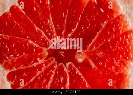 Half section of fresh juicy grapefruit, fruit background, organic or cooking concept Stock Photo