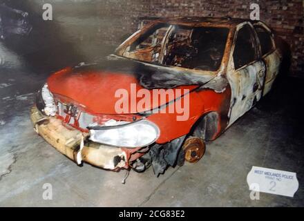 Collect image of the car used by the gunmen who murdered the two teenage friends Letisha Shakespeare, 17, and Charlene Ellis, 18, in Birmingham on January 2 as they celebrated at New Year. * The red Ford Mondeo has been recovered, it has been revealed, by the detective leading the investigation. Detective Superintendent Dave Mirfield, of West Midlands Police, said the burnt-out red Ford Mondeo was found with two shell casings used in the weapon which shot dead the two girls. Stock Photo