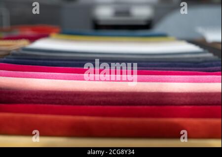 Folded soft luxury velvet samples in gradient colors Stock Photo