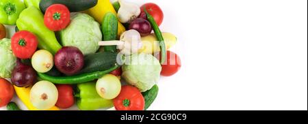 Ripe fresh vegetables in a large assortment on a white background, panorama. Stock Photo