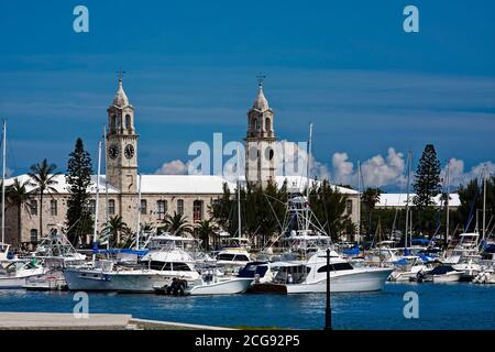 marina, boats docked, twin towers, stone, Clocktower Shopping Mall, tourism, vacation, leisure, travel, Royal Naval Dockyard, King's Wharf, Bermuda Stock Photo