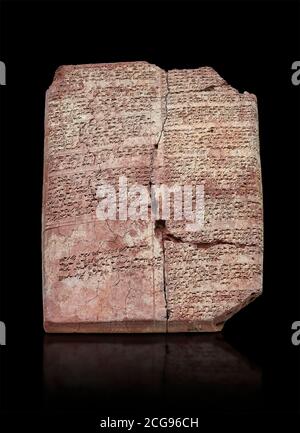 Hittite cuneiform clay tablet,  Hattusa, Hittite  Kingdom 1600-1200 BC, Bogazkale archaeological Museum, Turkey. Black background Stock Photo