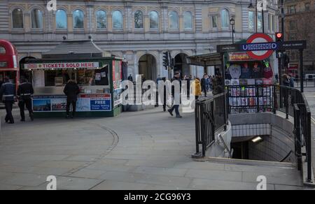 Entrance and exit of Charing Cross underground station seen with people ...