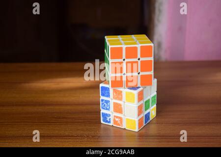 Rubik's cube solved and unsolved Stock Photo