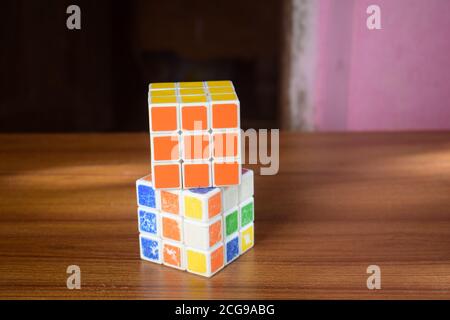 Rubik's cube solved and unsolved Stock Photo