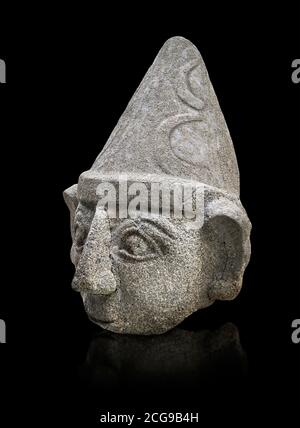 Hittite statue head of a god, Hittite capital Hattusa, Hittite Middle Kingdom 1650-1450 BC, Bogazkale archaeological Museum, Turkey. Black background Stock Photo