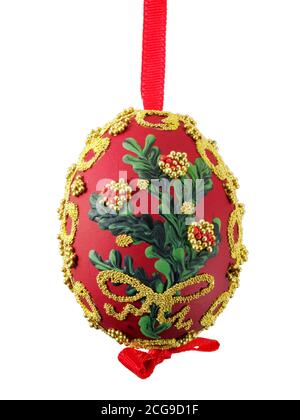 Red amd gold artisan hand made traditional Christmas bauble tree decoration, cut out Stock Photo