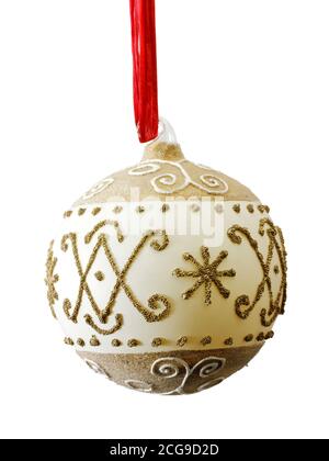 Hand painted gold and white artisan hand made traditional Christmas bauble tree decoration, cut out Stock Photo
