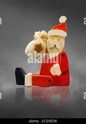 Wooden Christmas decoration of Father Christmas (Santa Claus), cut out Stock Photo