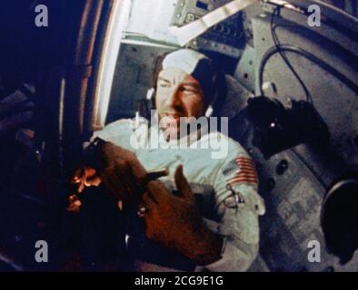 (21-27 Dec. 1968) --- Astronaut James A. Lovell Jr., command module pilot, is shown during intravehicular activity (IVA) on the Apollo 8 lunar orbit mission. Stock Photo