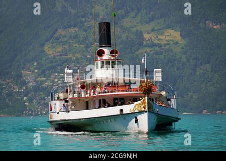 LAKE LUCERNE, SWITZERLAND - JUNE 02, 2019: Historic paddle steamer passenger boat on Lake Lucerne in summer. Stock Photo