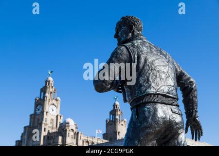 Statue of Captain FJ Walker seen in front of the three graces on the famous waterfront of Liverpool, captured in September 2020. Stock Photo