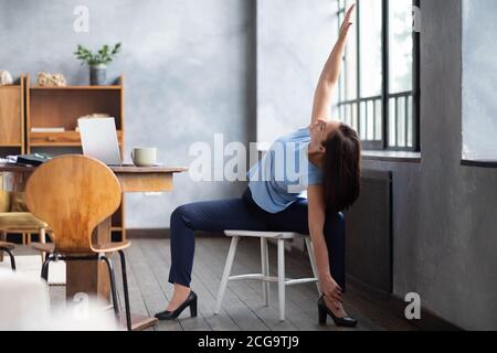 Standing twist pose hi-res stock photography and images - Alamy