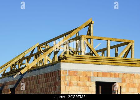 construction of a new residential house roof wooden structure Stock Photo